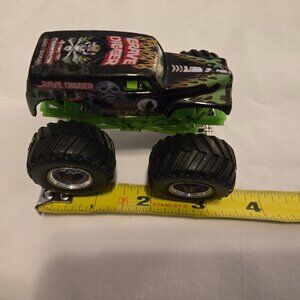 Grave Digger Mini Check photos for condition look nice. Combine for savings